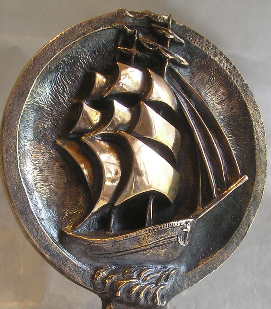 Boat bronze relief
